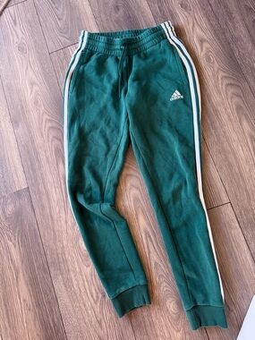 Green adidas track pants size XS